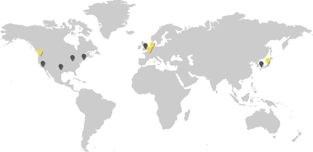 A map of the world showing the locations where Discogs employees work from with yellow pins for the regional hubs located in Portland, Amsterdam, and Tokyo. Other employees a spread across the USA, Europe, and Japan.