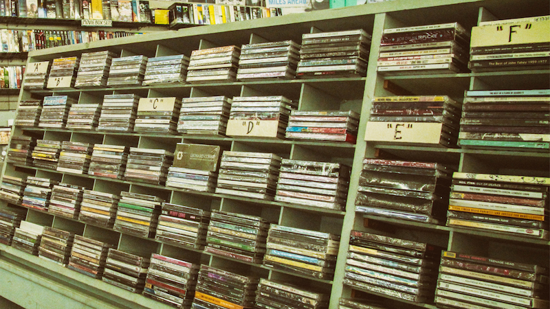 shelves of cds in a record store