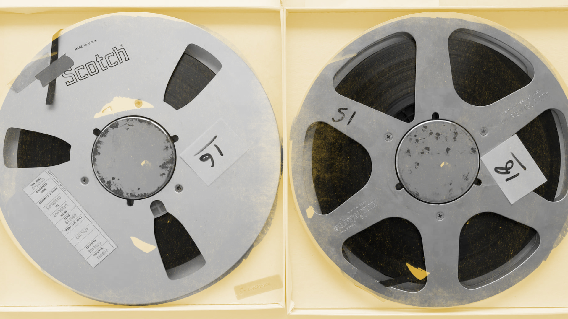two master tape reels with the numbers 16 and 18 on them