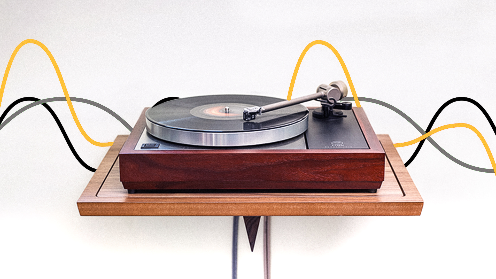 illustration of sound waves behind a photo of a turntable on a wooden block